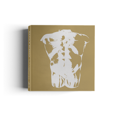 Book with a white dog silhouette on a beige cover against a white background